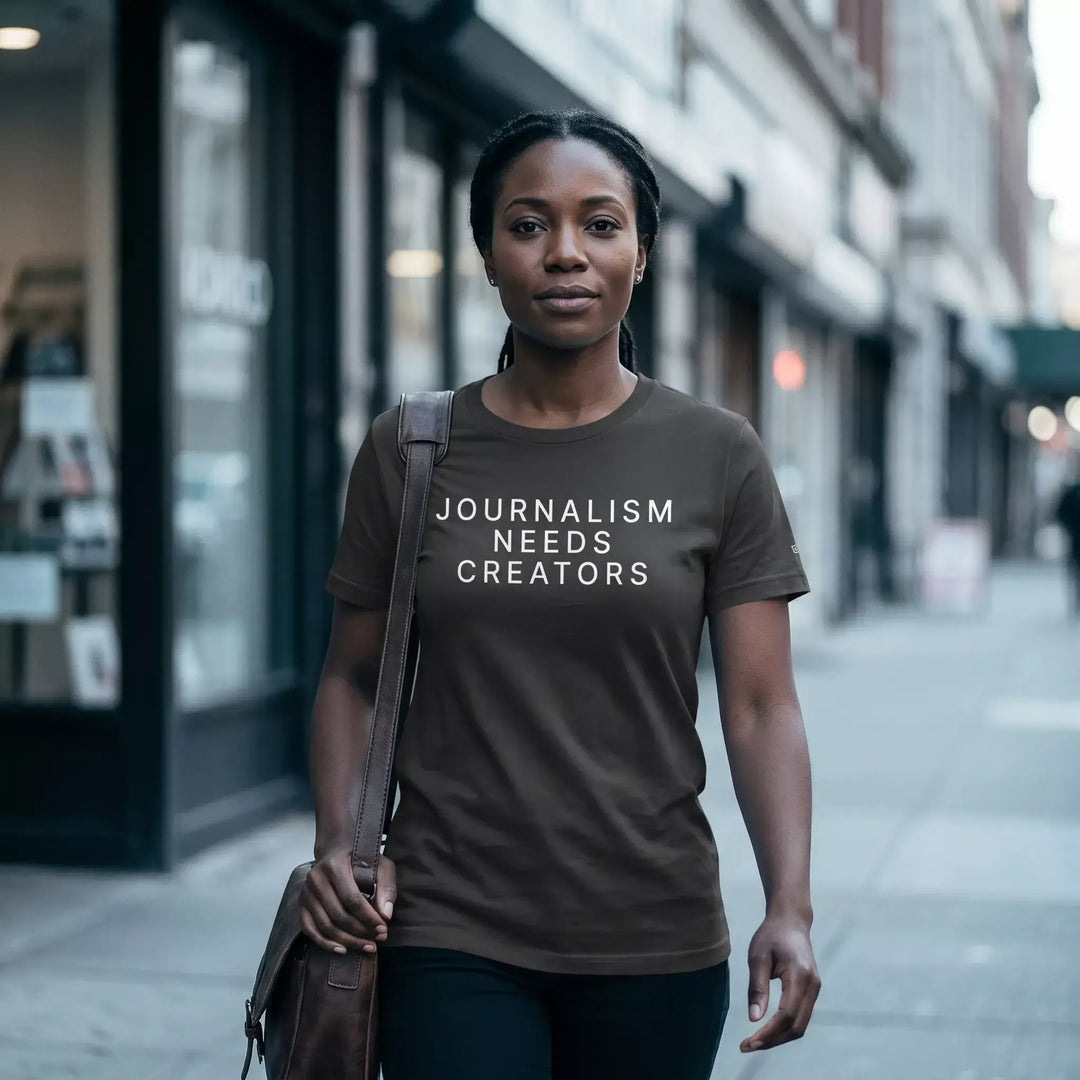 Woman wearing Creator Statement T-Shirt that says &